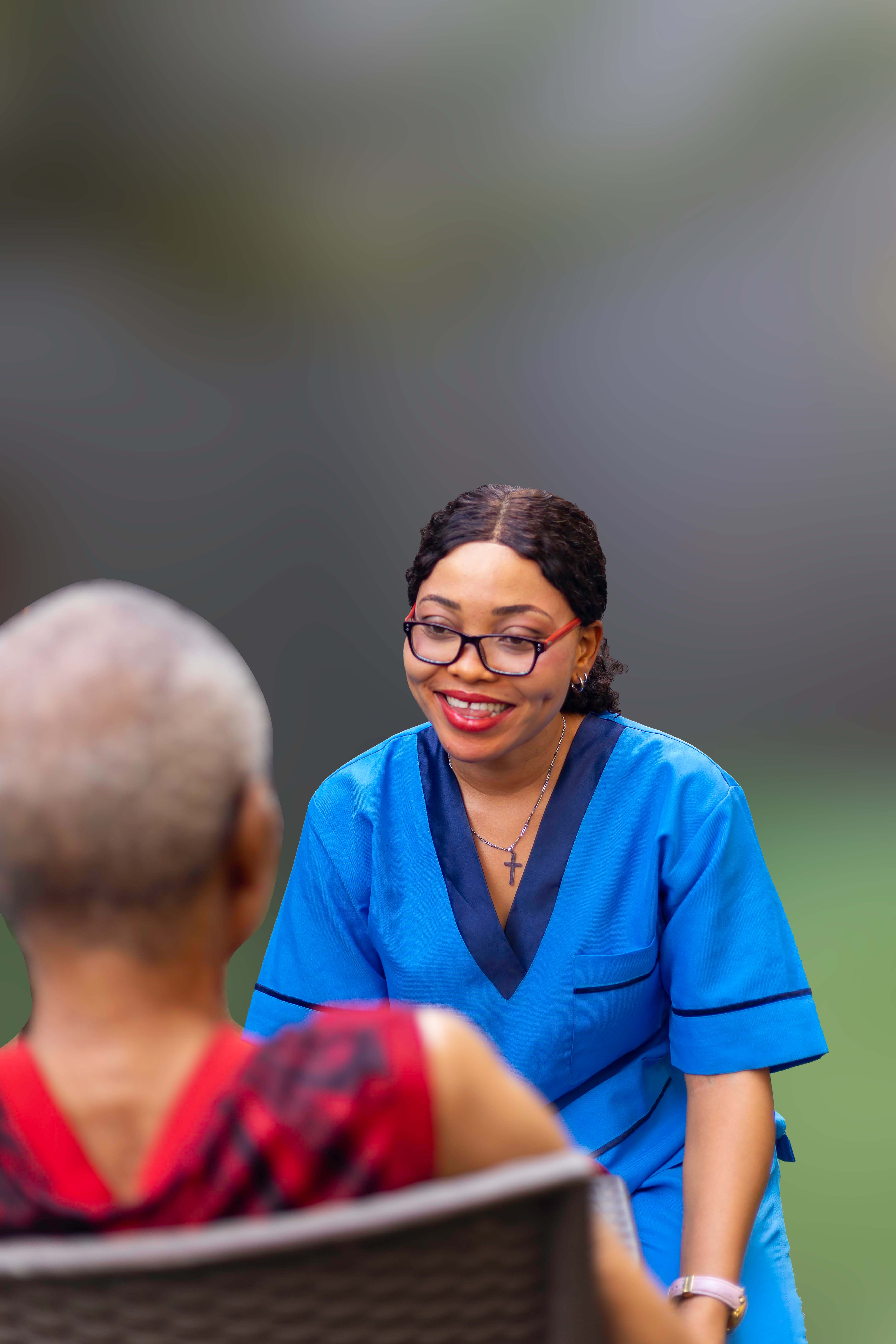 woman assisting elderly man